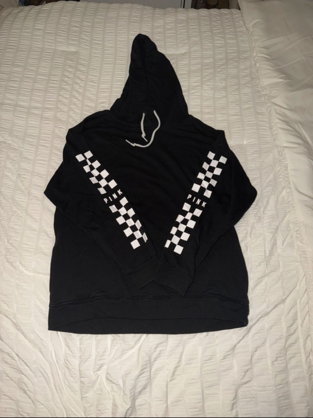 PINK Victoria's Secret Black Hoodie with White Checkerboard Sleeve Stripes